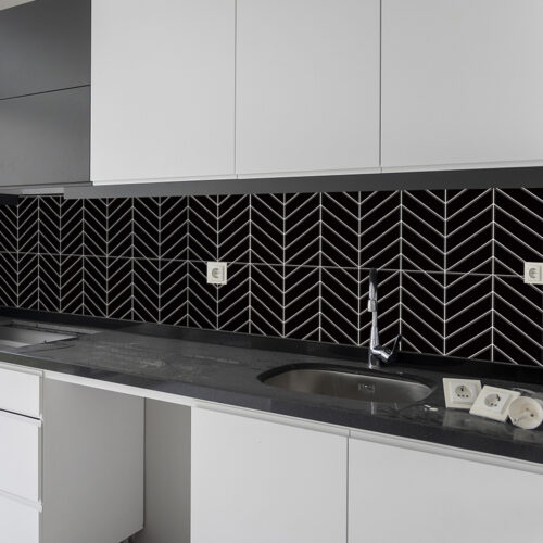 black herringbone peel and stick kitchen tiles