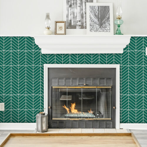 green herringbone tiles fireplace