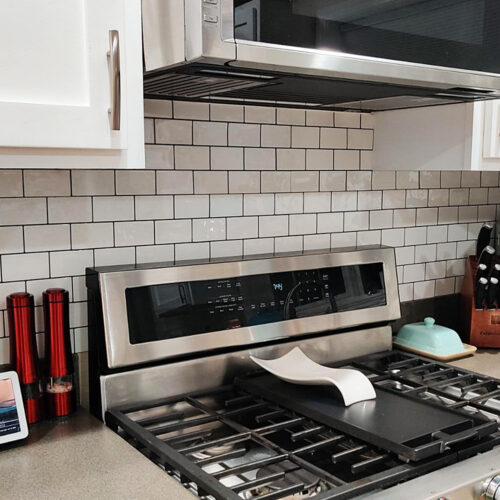 kitchen backsplash black grout white tiles