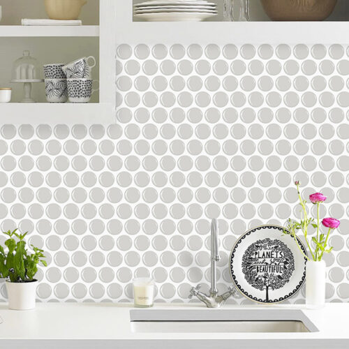 gray penny round tile backsplash