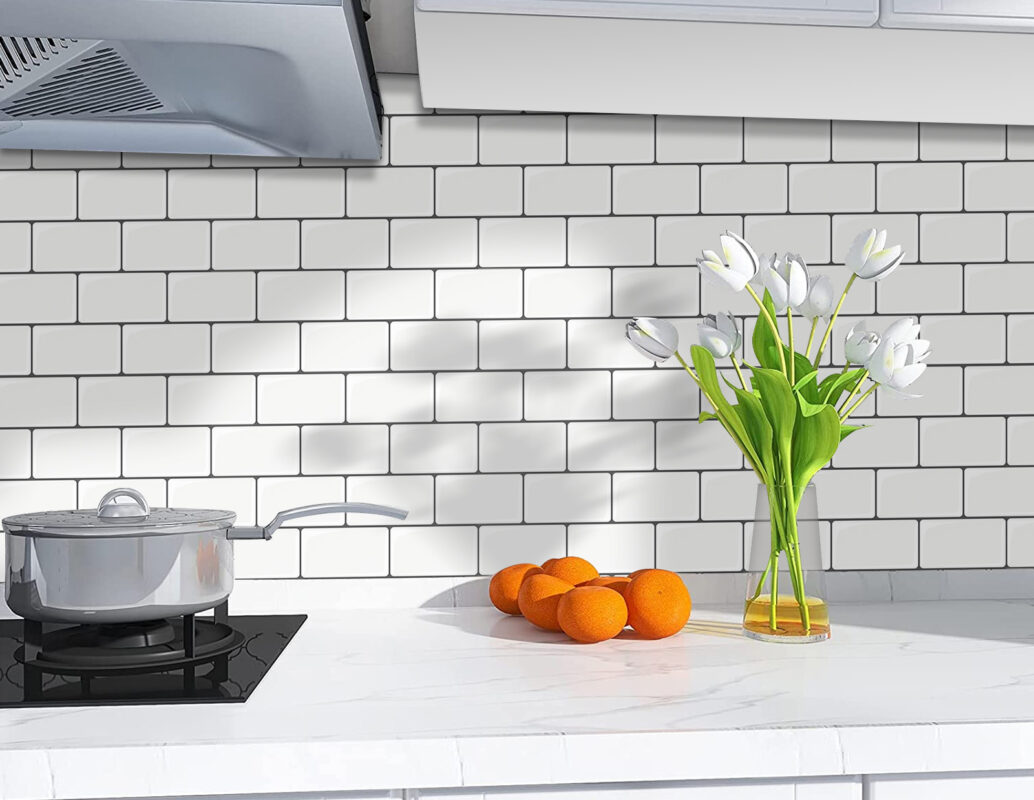 Peel and Stick White Subway Tiles over existing tiles