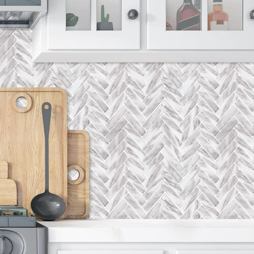 peel and stick herringbone marble look tile backsplash