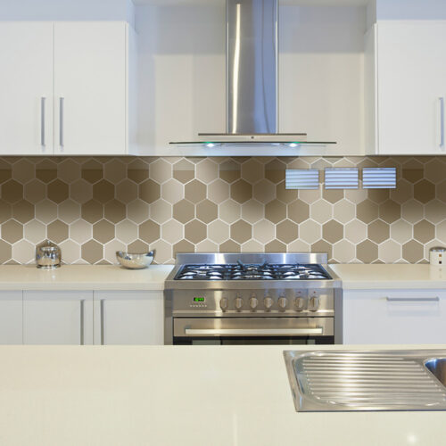 beige hexagon mosaic tile backsplash