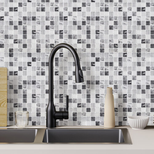 black and white marble mosaic tiles behind sink wall